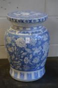 A Chinese blue and white jardiniere or seat.