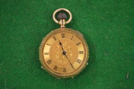 A Ladies engraved gold pocket watch stamped 14k.