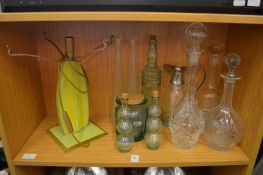 Cut glass decanters and other items to include a decorative lamp.