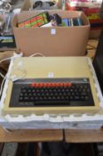 A BBC micro computer system and associated books.