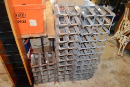 Three old wine racks.