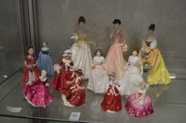 A collection of Doulton and other figurines.