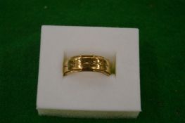 A 9 carat gold ring.