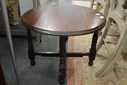 An oak folding coffee table.