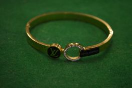 A decorative bangle.