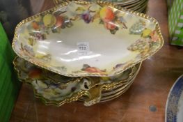 Fruit decorated dessert service.