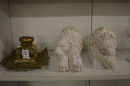 A cut glass and brass inkwell and a pair of bookends.