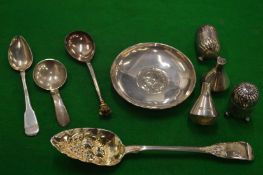 Small items of silverware to include an anointing spoon and other items.