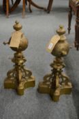 A good pair of 19th century cast brass chenets with three scrolling supports and base, 1' 5