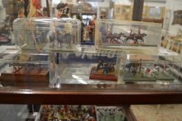 A collection of miniature military figures in five cases.