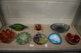 Colourful studio glassware to include bowls and dishes.