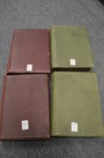 A set of four photograph albums with contents.