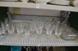 Cut glass drinking glasses, bowls and decanters.