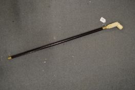 A walking stick, the handle modelled as an octopus.