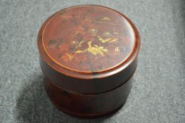 A Chinese circular lacquer bowl and cover.