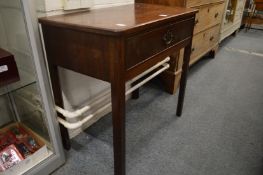 A George III mahogany single drawer side table.