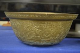 A Chinese brass bowl.