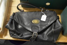 An Orient Express collection handbag.