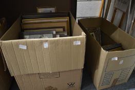 Two boxes of assorted paintings and prints etc.