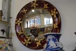 Decorative circular mirror.