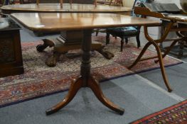A 19th century mahogany tilt-top tripod table.