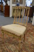 A 19th century French painted beech wood side chair (distressed).