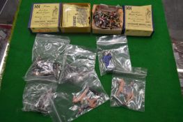 A collection of small die cast military figures.
