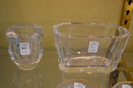 Two heavy glass vases.