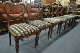 A good set of eight William IV rosewood kidney back dining chairs with individually needlework