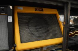 A Crate Taxi guitar amplifier.
