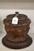 A good carved oak cigar or tobacco jar.