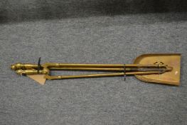 A set of three Victorian brass fire irons.