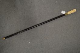 A walking stick, the handle modelled as a group of rats.