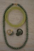 A collection of Chinese jade jewellery.
