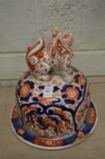 A large imari vase cover with lion finial.