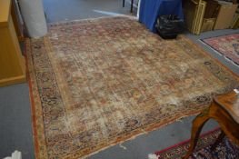 An old Persian carpet, worn 9' 6