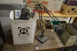 An angle poise lamp and microphones.