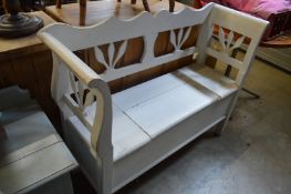 A painted hall bench.