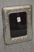 A silver plated photograph frame.