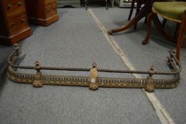 A 19th century brass pierced fender with rope work, 4' 3
