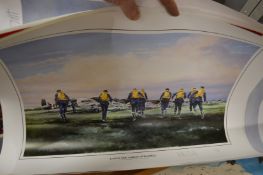 A group of unframed prints.