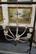 A good stylish chrome plated eight branch chandelier with crystal shades.