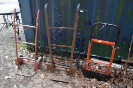 Three various sack barrows.