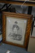 A maple framed engraving of Bonaparte and a box of other engravings.