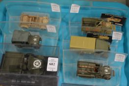 Six various die cast armoured vehicles, in a perspex case.