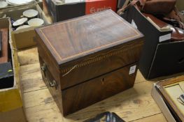 A George III mahogany six bottle decanter set, some bottles replaced.