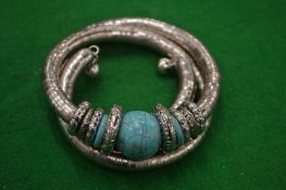 A decorative expanding bracelet.