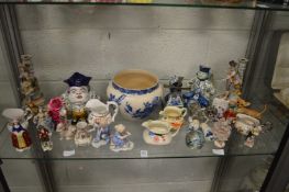 A good collection of decorative china to include figurines, jugs etc.