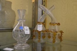 Glass bottle and an oil bottle.