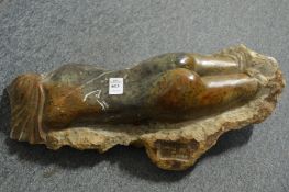 Carlos de Almeida, a carved marble reclining nude, signed and dated.